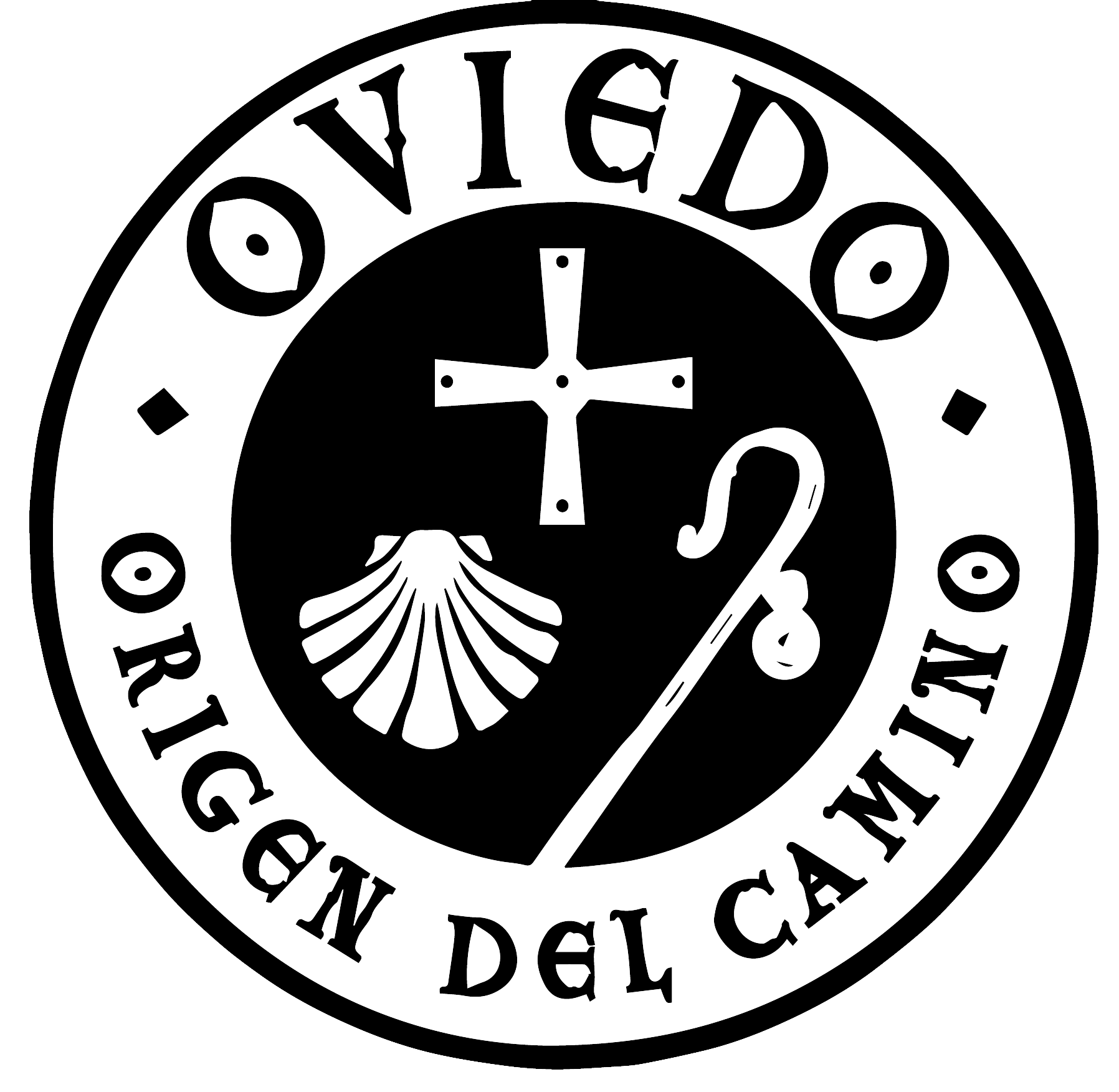 Logo oficial del Camino Primitivo, en el que aparece representado dentro de un círculo el bordón, la concha y la cruz de Santiago, rodeados del lema 'Oviedo, origen del camino'